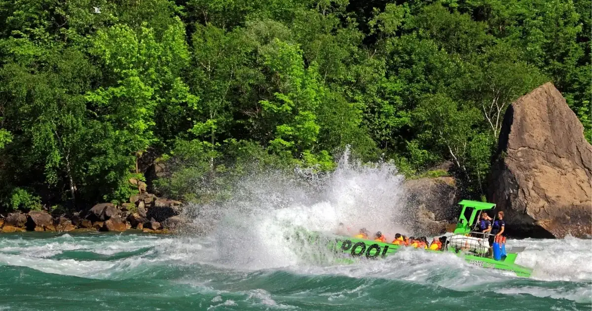 A Whirlpool Jet Boat throwing spray as it runs the rapids of the lower Niagara River gorge